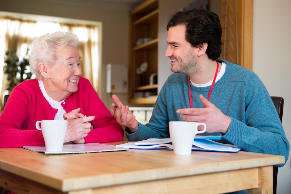 Lady talking with a caseworker